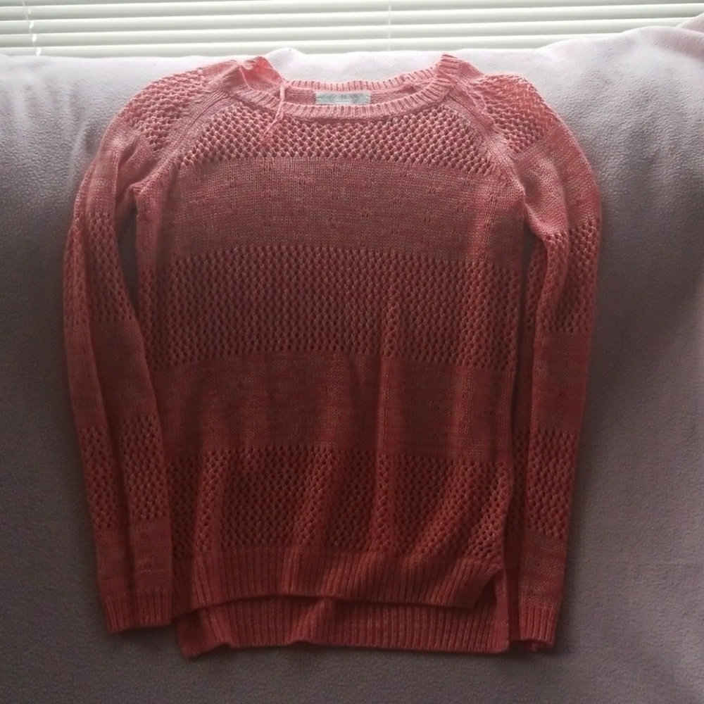 Pink knitted sweater